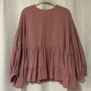 Pink longsleeve peplum top.